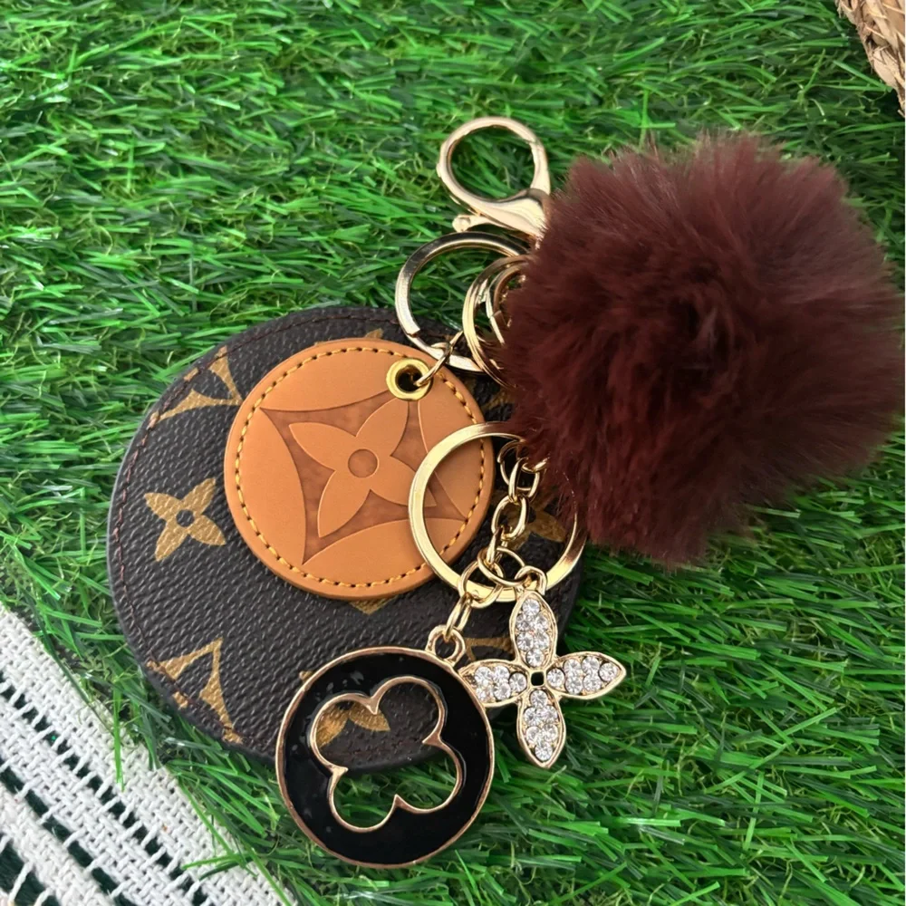 Monogram-Pattern Brown Pom-Pom Keychain - Picture 3 of 5